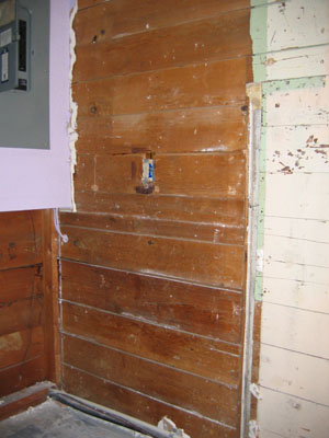 electric box and wall of wood