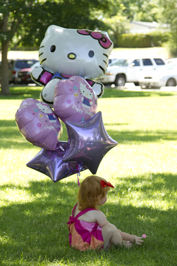 Little with her Hello Kitty Balloon Boquet.