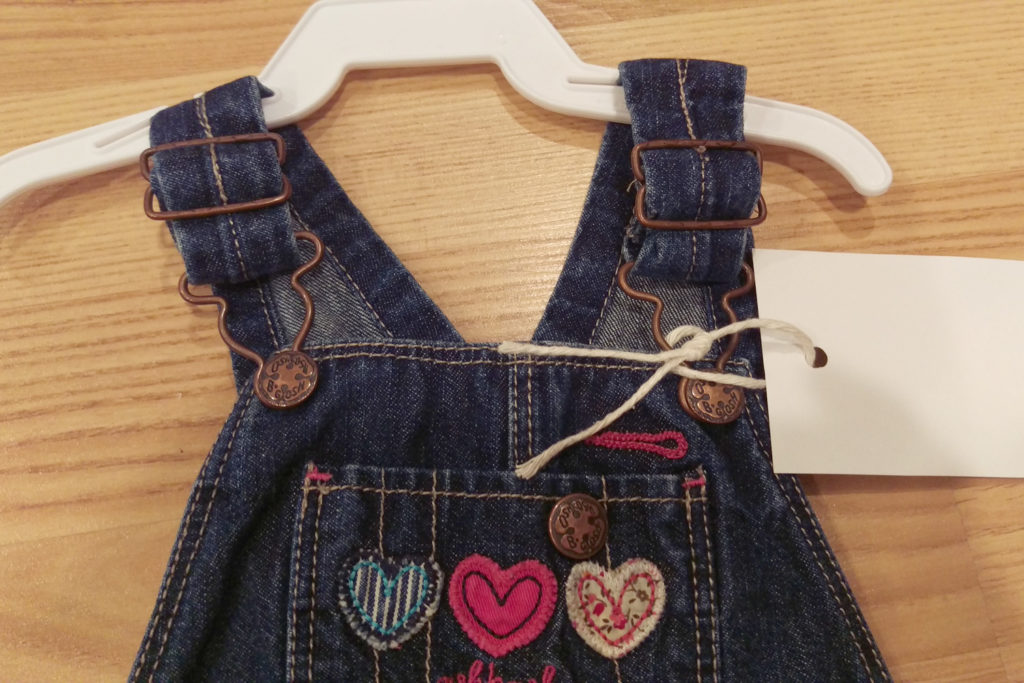 overalls with tag on strap hardware